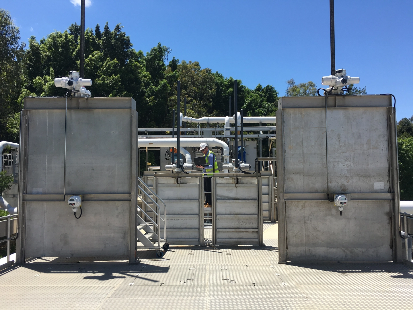 <p>Site photo, IQ3 intelligent electric actuators with Remote Hand Stations (RHS) on penstock valves at a wastewater treatment plant in Australia. </p>